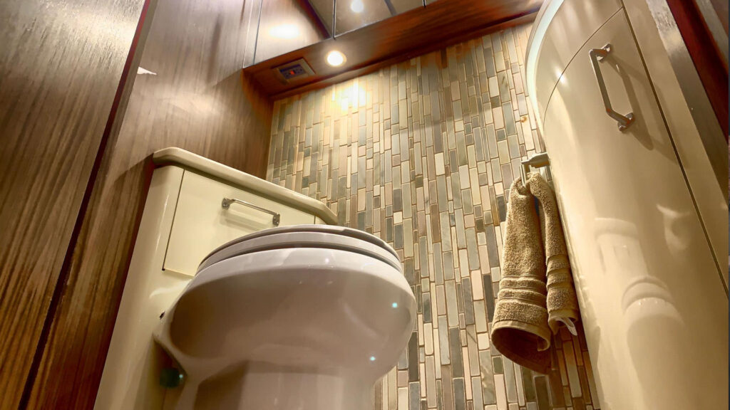 how does a camper toilet work